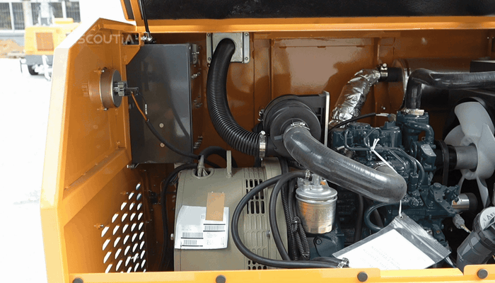 The diesel generator powertrain uses an integrated layout with the engine, generating section, and cooling components clearly visible for routine insp