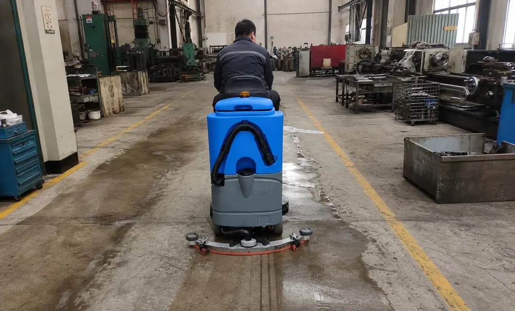 Workshop floor care around production equipment.