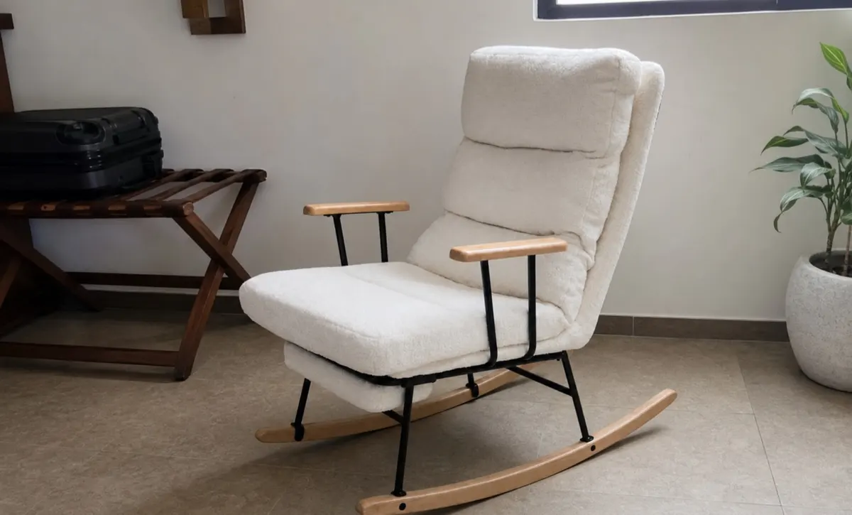 Casual rocking chair beside a storage wall for relaxed home seating.