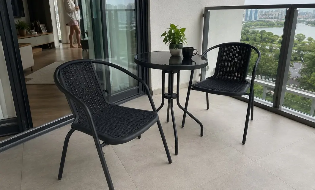 Light seating among greenery for relaxed outdoor dining, conversation, and rest.