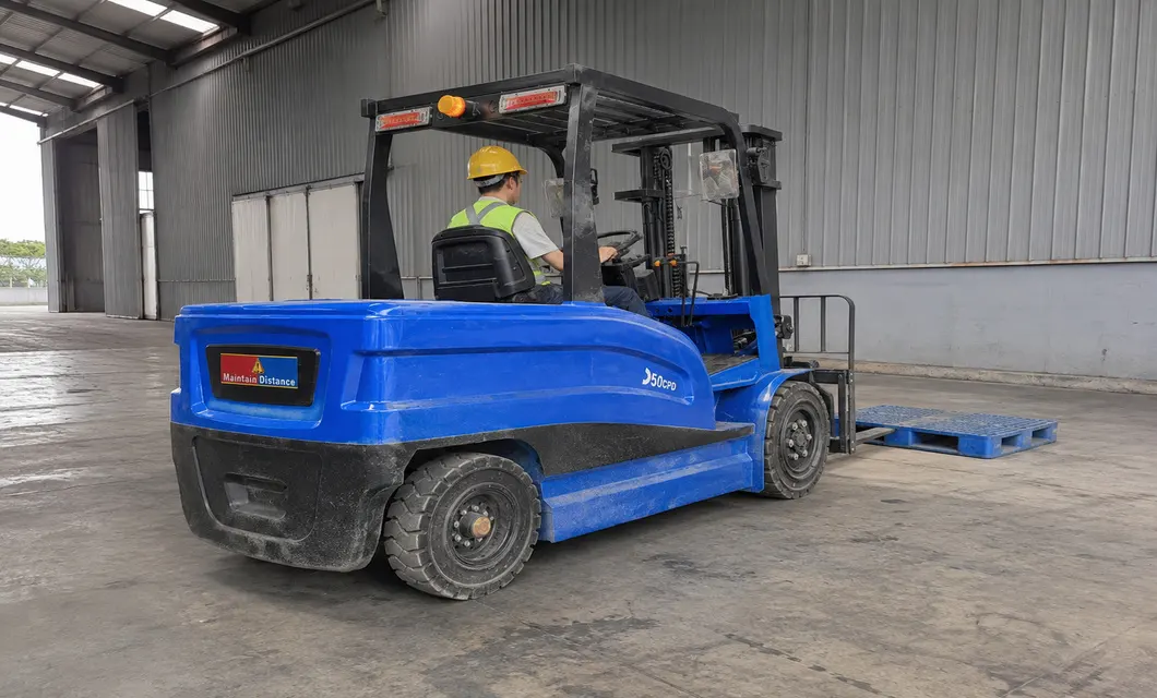 Covered Yard Blue Forklift Rear Staging