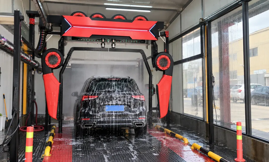 Dedicated indoor installation for automatic vehicle washing and rinsing.