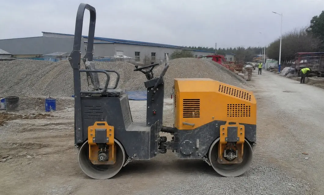 Compacts factory gravel yards with steady passes for firm surfaces.