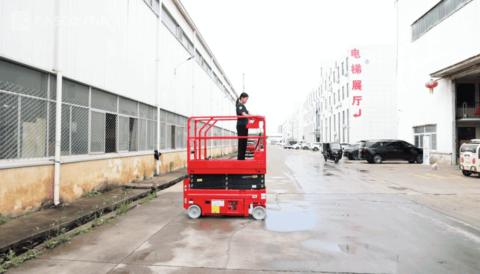The scissor mechanism raises and lowers the platform, allowing its height to be adjusted to suit different working positions