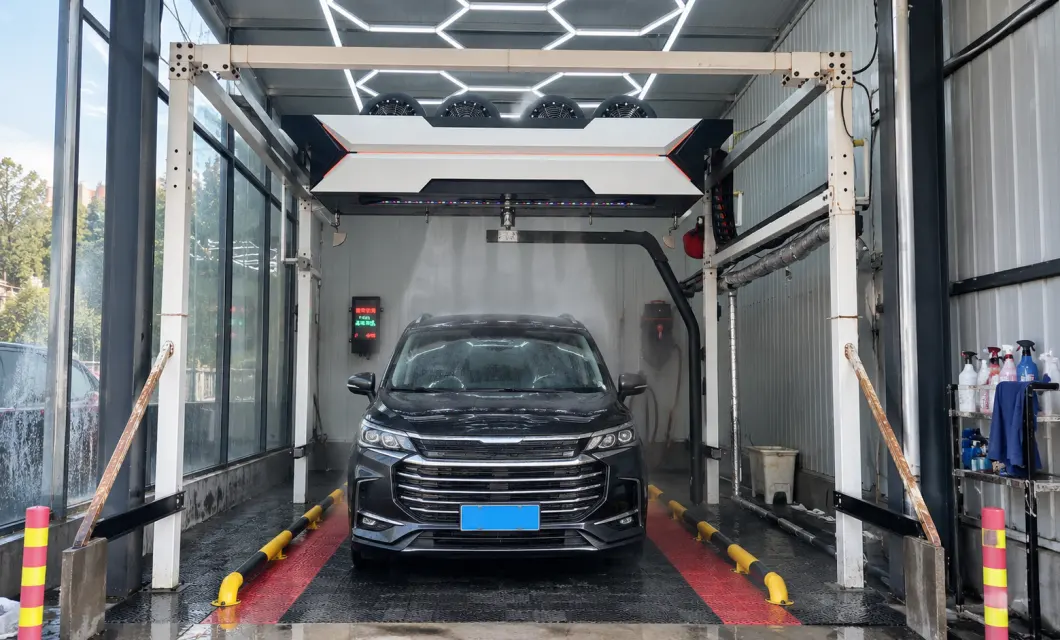 Gantry installation supports automated cleaning along a dedicated vehicle lane.