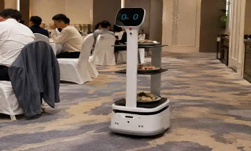 Delivers meals efficiently along prepared hotel banquet routes.