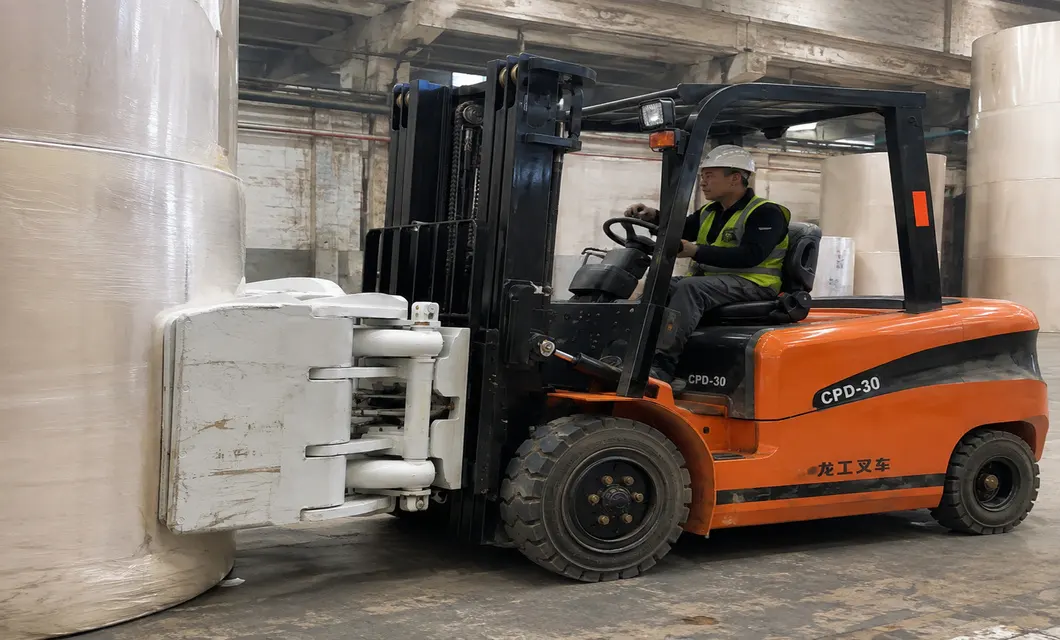 Paper Mill Orange Clamp Forklift Handling