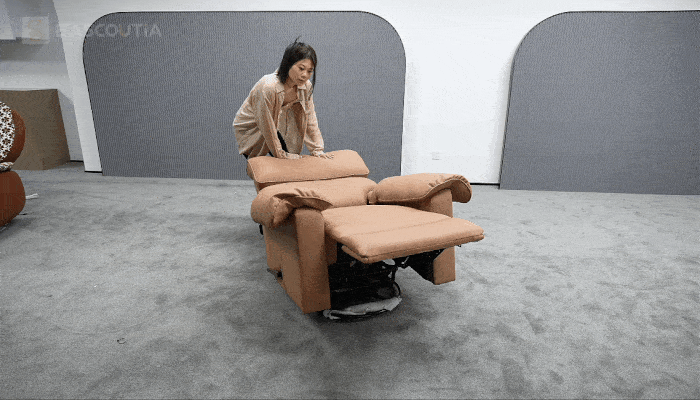 The chair remains stable while reclining and returning upright, with the base staying firmly supported on the floor.