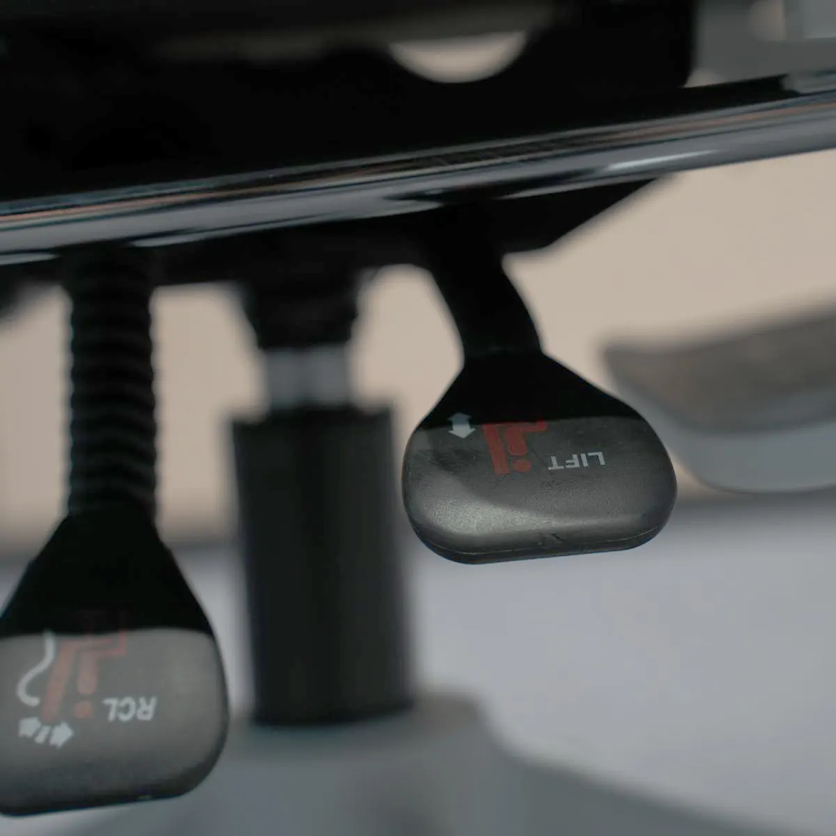 Seat Base Adjustment Lever Close Up