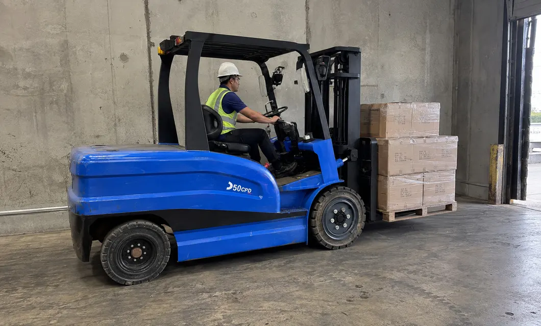 Warehouse Blue Forklift Pallet Transfer