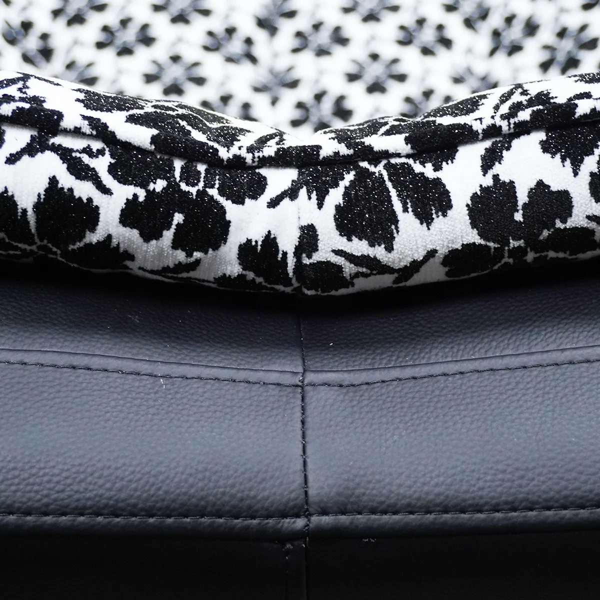 Bottom edge of the backrest